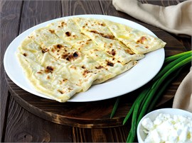 {{photo.Alt || photo.Description || 'Чуду с творогом и зелёным луком '}}