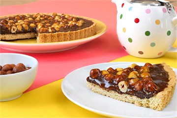 {{photo.Alt || photo.Description || 'Тарт с шоколадом, карамелью и фундуком'}}